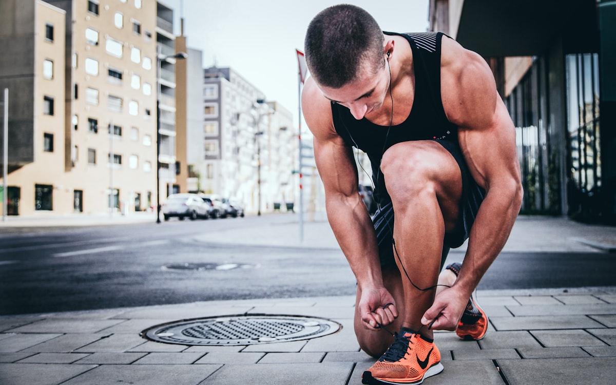 Male athlete performing strength training with proper nutrition